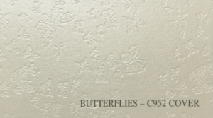 Close-up of Butterflies C952 embossed 11pt cover stock showing iridescent texture.