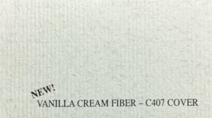 Close-up of C407 Vanilla Cream Fiber 80 lb cover paper showing ribbed texture and organic fiber flecks.