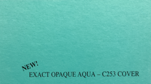 A textured aqua-colored paper. Creating a fresh and vibrant feel.